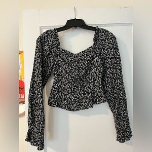 Black and white patterned blouse